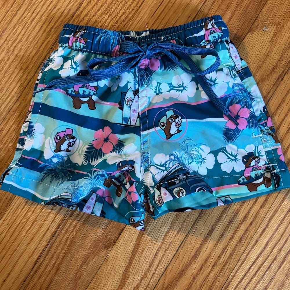 Buc-ee's Toddler 6-9 M Swim Trunks Hawaiian Palm Trees Surfing Floral Teal Green